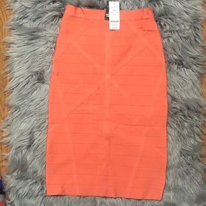 Long Coral Bebé Pencil Skirt